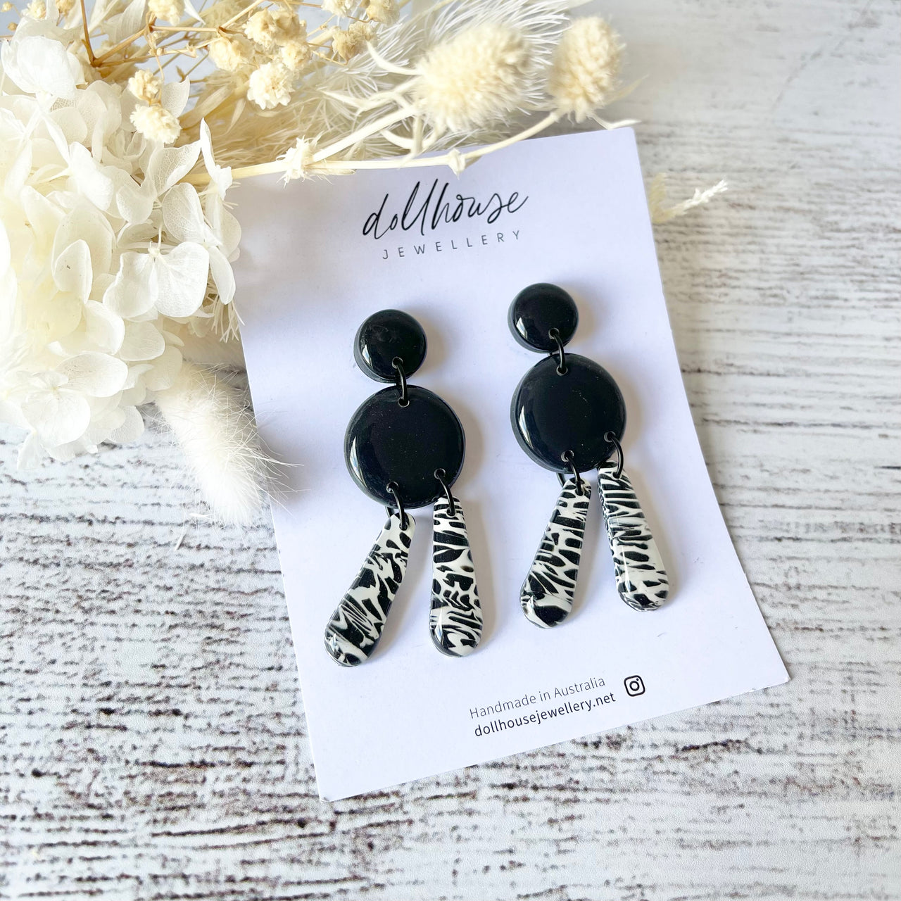 'Black and White Swirl' Dangles by Dollhouse Jewellery. Australian Art Prints and Homewares. Green Door Decor. www.greendoordecor.com.au