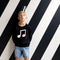 'Musical' Black Baby Sweater by Castle and Things. Australian Art Prints and Homewares. Green Door Decor. www.greendoordecor.com.au