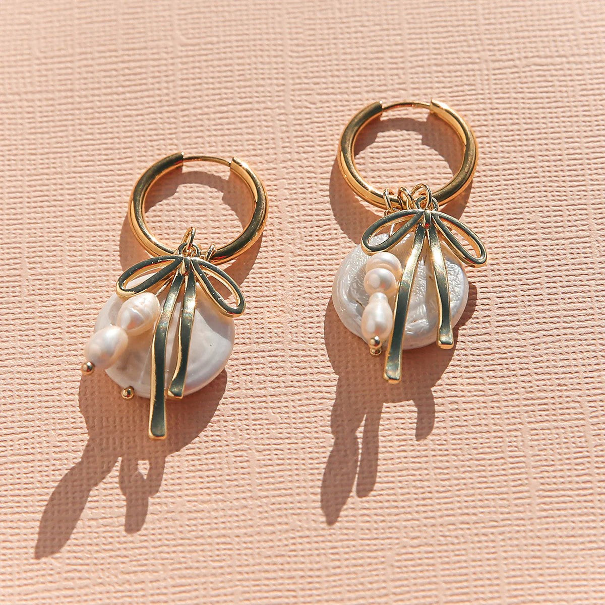 'Bow Pearl' Huggie Hoops by Kingston Jewellery. Australian Art Prints, Fashion and Homewares. Green Door Decor. www.greendoordecor.com.au