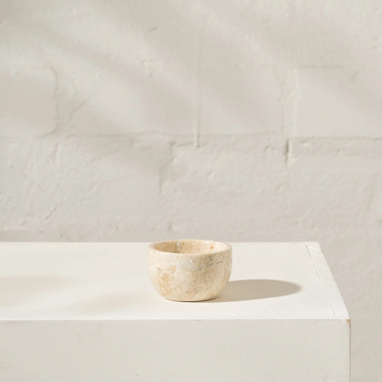'Chima' Travertine Bowl by Inartisan. Designed in Australia, hand-made in Indonesia. We proudly support fun and beautiful art prints, textiles, homewares and jewellery by Aussie Creatives. www.greendoordecor.com.au