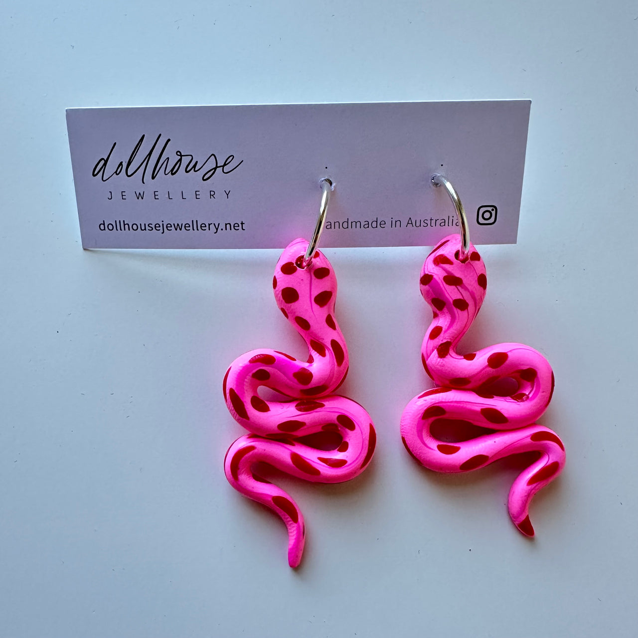 'Red Pink Snake' Dangles by Dollhouse Jewellery. Australian Art Prints and Homewares. Green Door Decor. www.greendoordecor.com.au