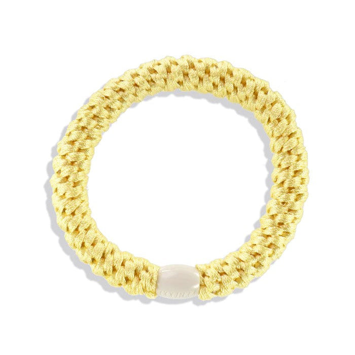 KKNEKKI Original Hair Tie | Light Yellow by KKNEKKI. Australian Art Prints, Gifts, Fashion and Homewares. Green Door Decor. www.greendoordecor.com.au