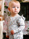 'Sweet Garden' Precious Frill Coverall Onesie by Fleur Harris. Australian Art Prints and Homewares. Green Door Decor. www.greendoordecor.com.au