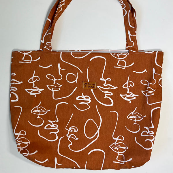 Tote Bag | Faces Burnt Orange by Zephyr and soul. Australian Art Prints and Homewares. Green Door Decor. www.greendoordecor.com.au