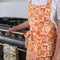 Apron | Chamomile Orange by Bonnie and Neil. Australian Art Prints and Homewares. Green Door Decor. www.greendoordecor.com.au